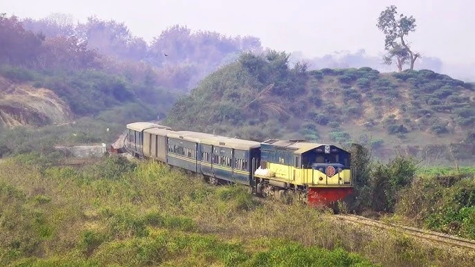 Bangladesh train passing through the tea gardens and hills between Dhaka and Sylhet