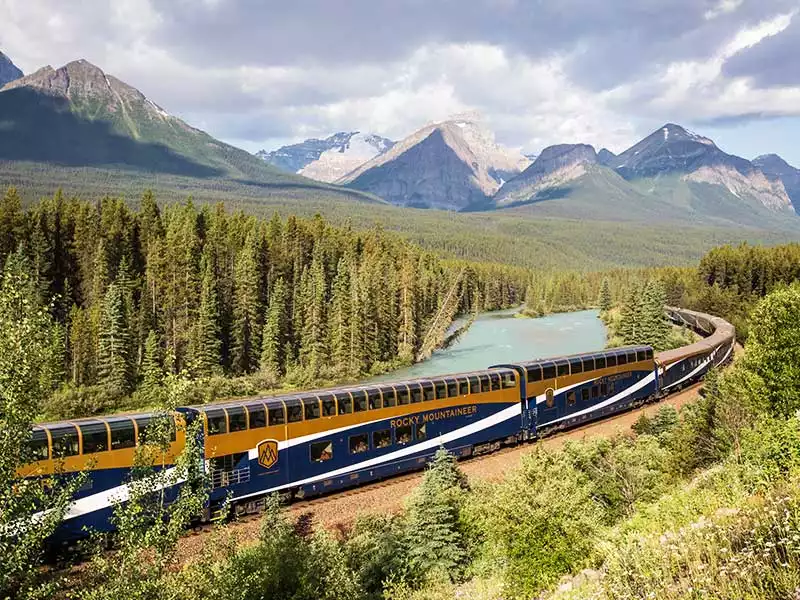 Rocky Mountaineer train traveling through the Canadian Rocky Mountains